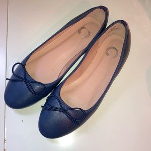 Navy ballet flats. NEVER WORN. Size 8